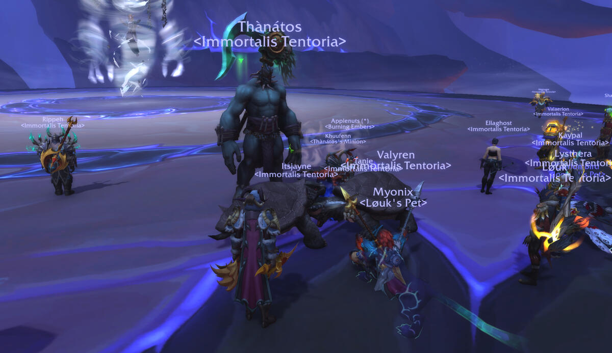 Immortalis Tentoria guildies standing in front of the defeated Remornia